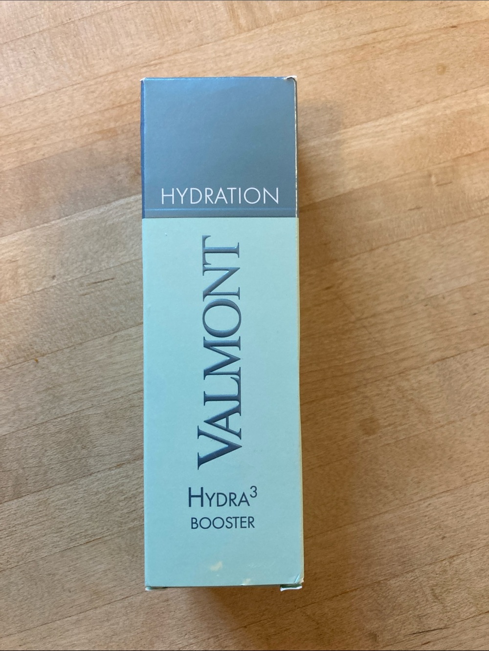 Valmont Hydra3 Booster in Pale Aqua and Steel Gray Packaging